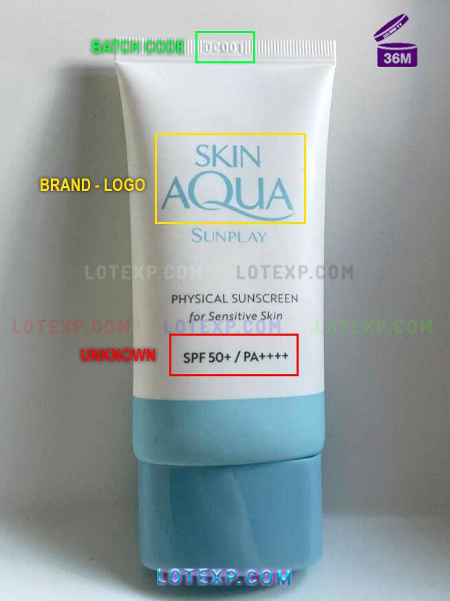 Skin Aqua Batch Code 2 A hand holding a Skin Aqua Tone Up UV Essence, signifying checking product dates before use.