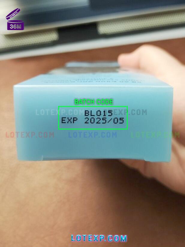 Skin Aqua Batch Code 5 Close-up of a Skin Aqua UV Super Moisture Milk tube, highlighting the batch code area for date lookup.