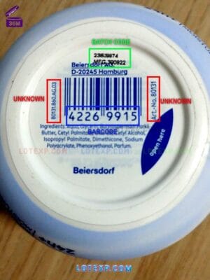 Nivea Baby Oil bottle with its production batch code visible.