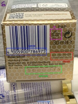 Nivea conditioner bottle, showing its batch number for date checking.